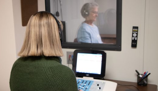 A girl testing a ladies hearing